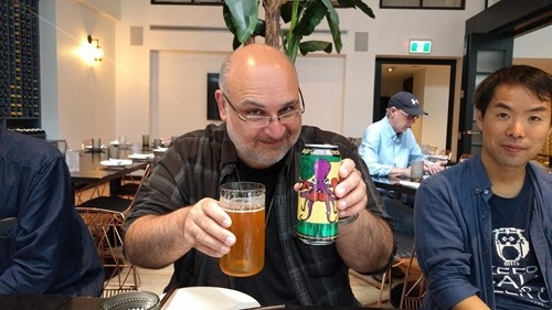Azam drinking OCTO beer Azam drinking OCTO beer