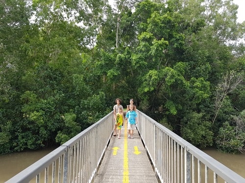Crossing a bridge at the botanical gardens Crossing a bridge at the botanical gardens