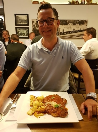 Sander trying schnitzel with Bolognaise sauce Sander trying schnitzel with Bolognaise sauce