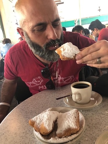 Eating beignets at Café du Monde Eating beignets at Café du Monde